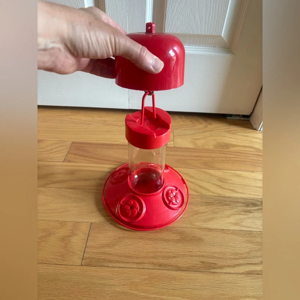 Red hummingbird feeder